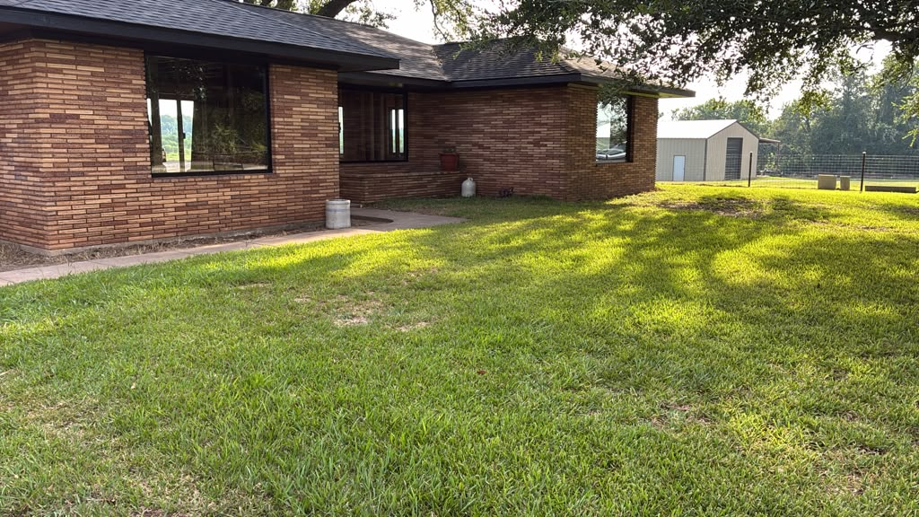 Completed front elevation with customized windows and entry door