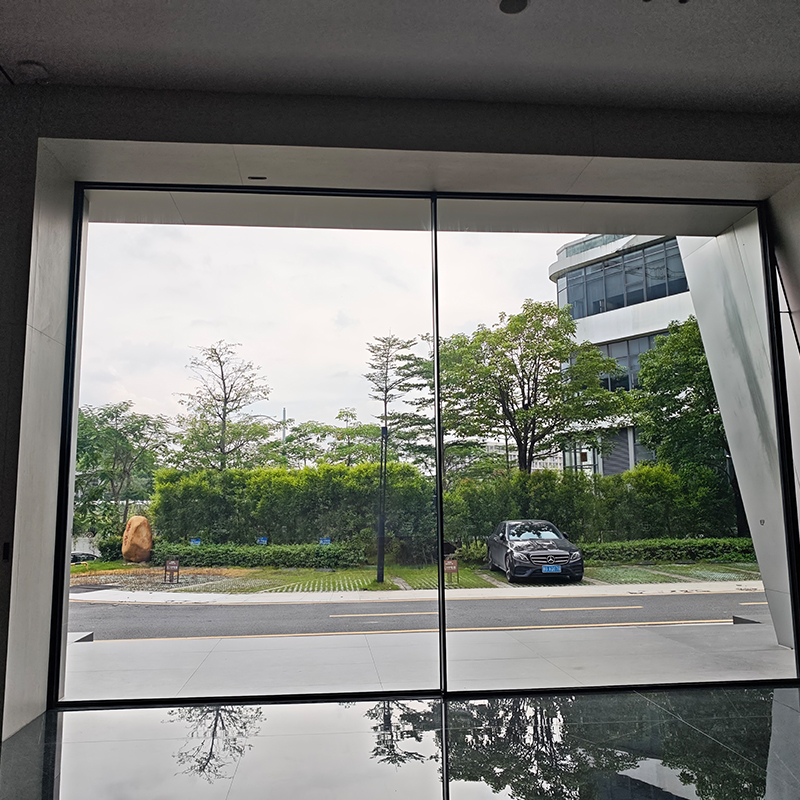 DERCHI sliding door display viewed from inside toward a garden