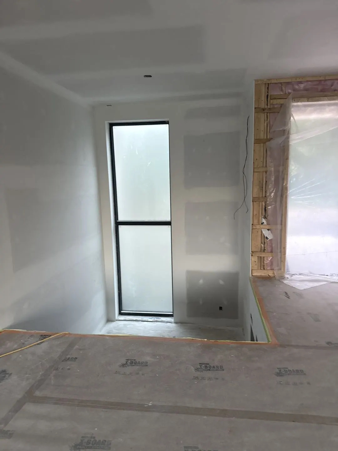 Interior structural transition area with aluminum window frames and modern villa design